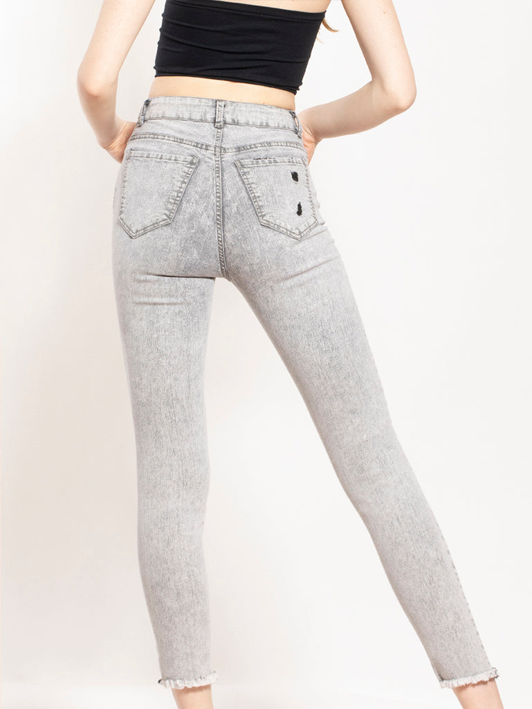 Pantalón de mezclilla gris ajustado de bolsillos y hendidura en pierna - Liza Pons